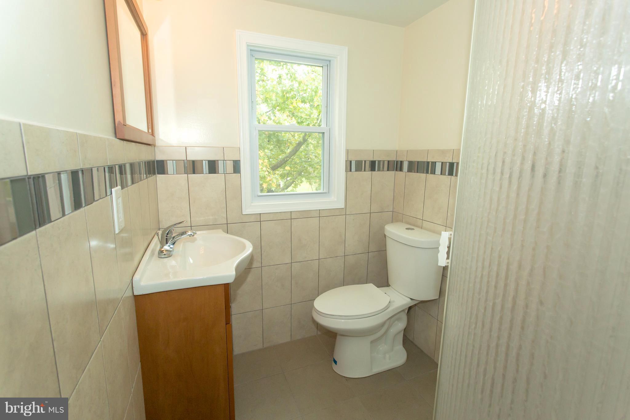 8222 Frye Road Alexandria, VA 22309 - Photo 11 of 27 Fully renovated bath on upper level