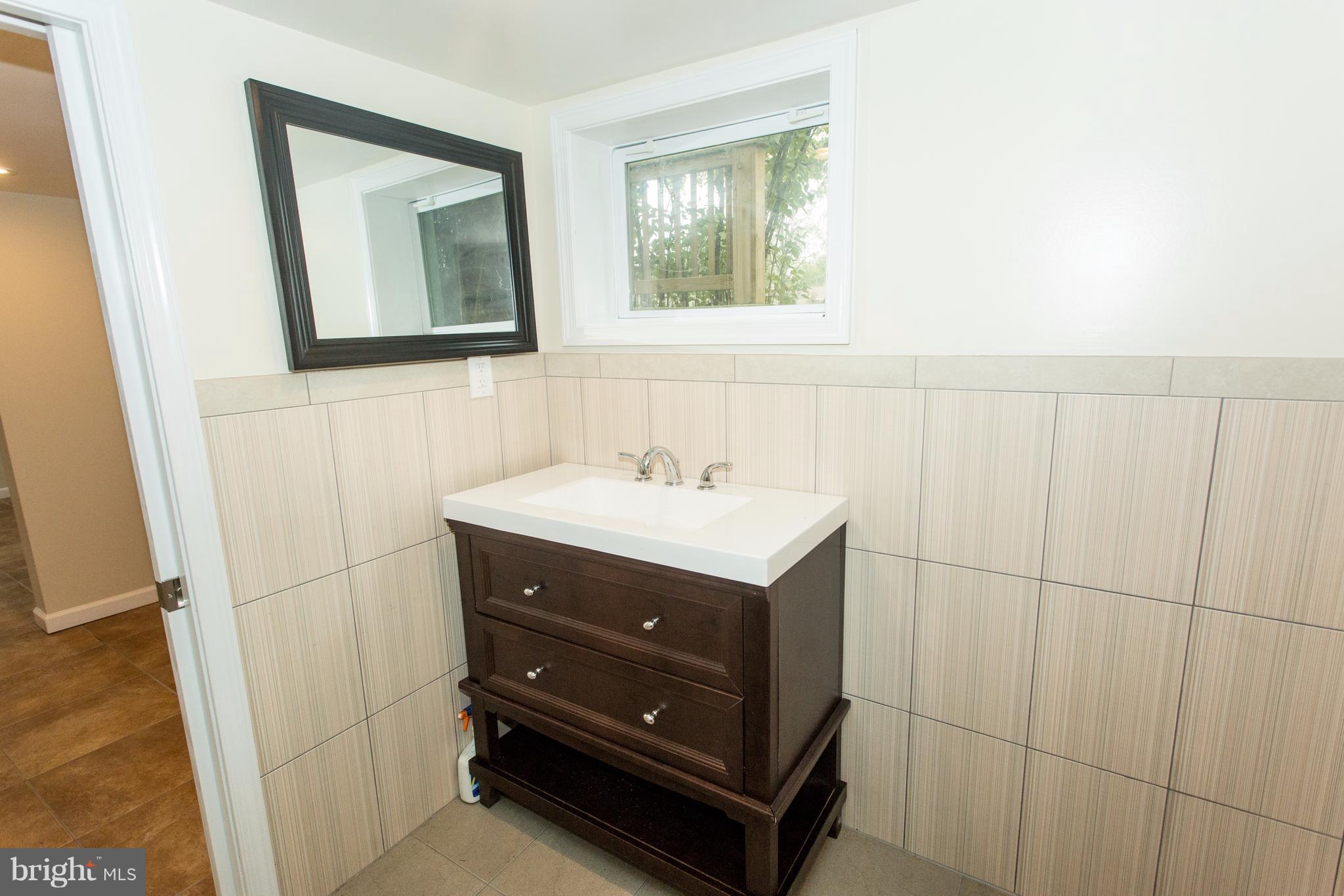 8222 Frye Road Alexandria, VA 22309 - Photo 18 of 27 Beautiful vanity in basement bath