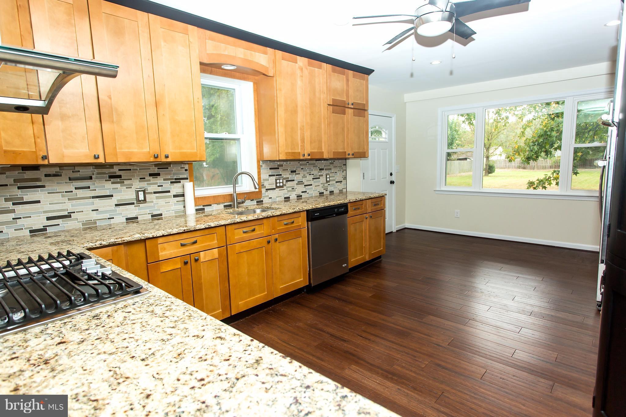 8222 Frye Road Alexandria, VA 22309 - Photo 4 of 27 Kitchen with granite counter tops