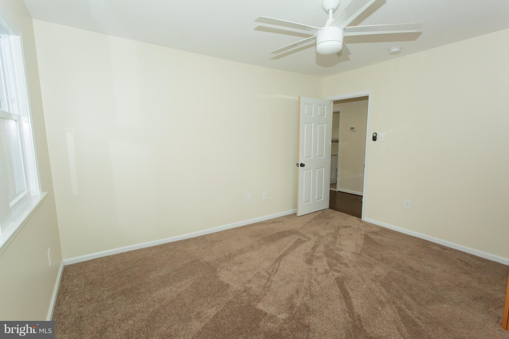 8222 Frye Road Alexandria, VA 22309 - Photo 8 of 27 Bedroom on main level with new carpets