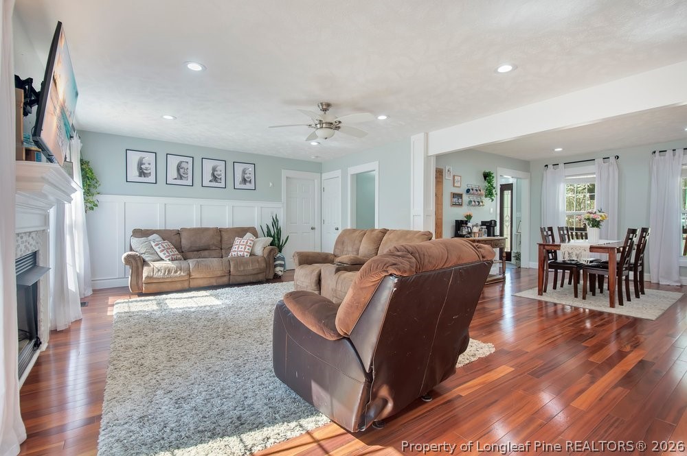 419 Senter Lane Bunnlevel, NC 28323 - Photo 8 of 49 a living room with furniture and a table