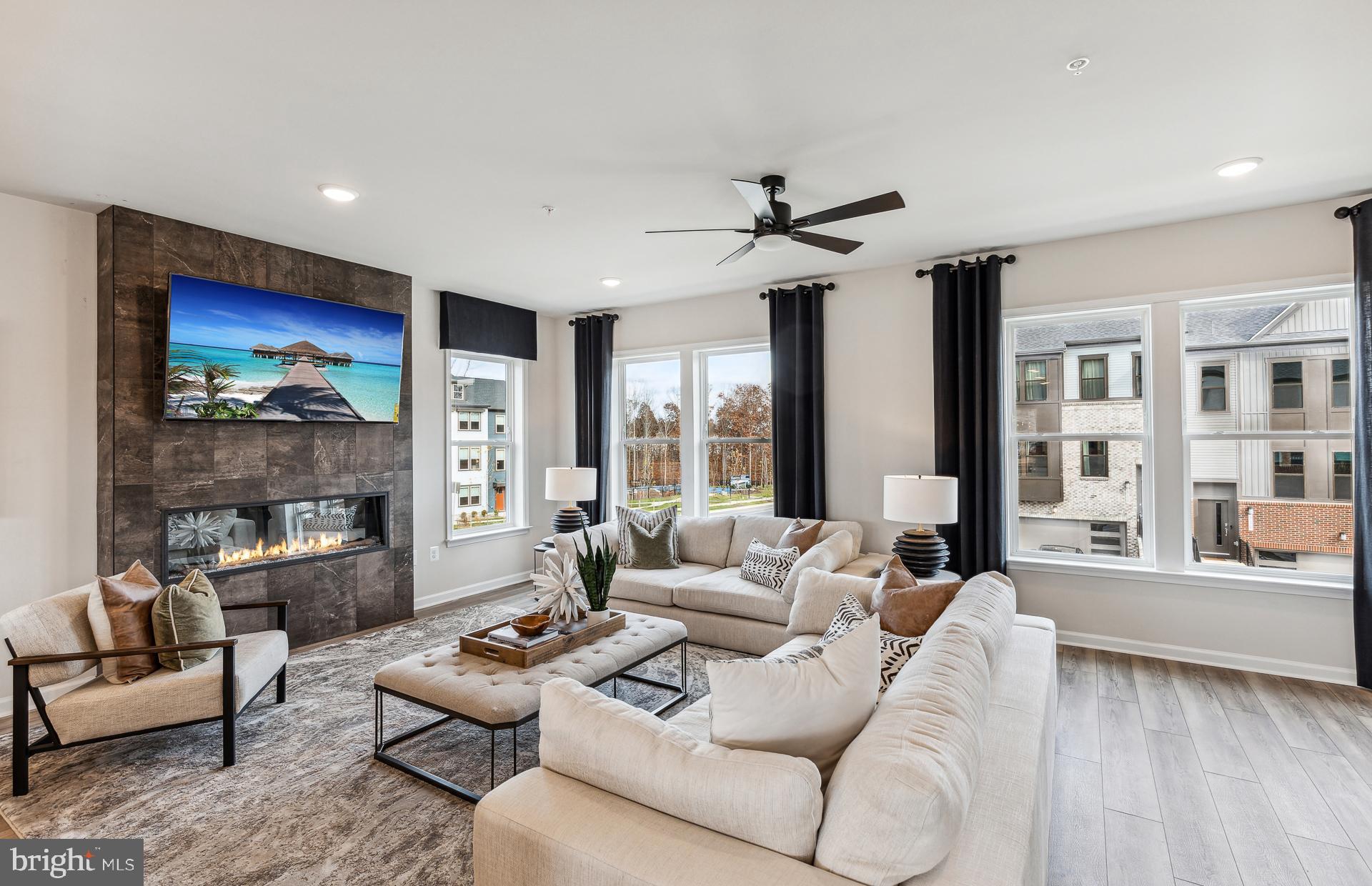 42609 Houdini Rst Terrace Leesburg, VA 20176 - Photo 12 of 27 a living room with furniture and a fireplace