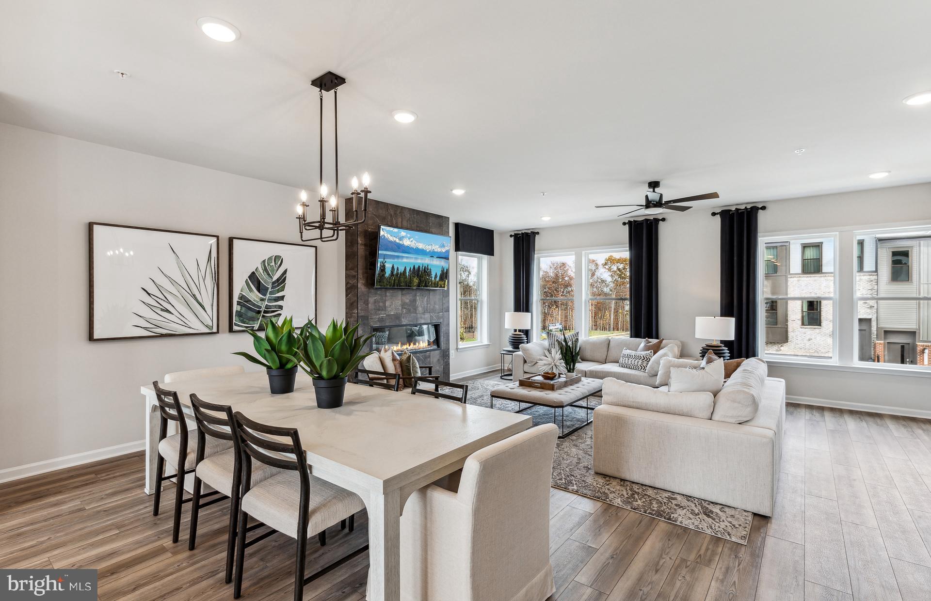 42609 Houdini Rst Terrace Leesburg, VA 20176 - Photo 13 of 27 a living room with furniture and a large window