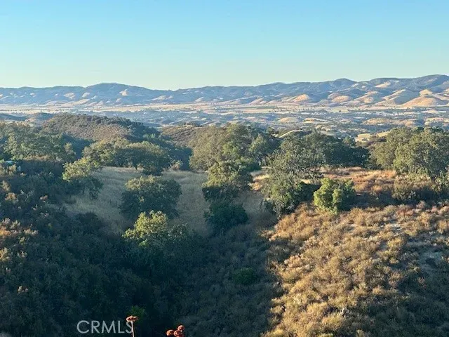 a view of a lake with mountains in the background