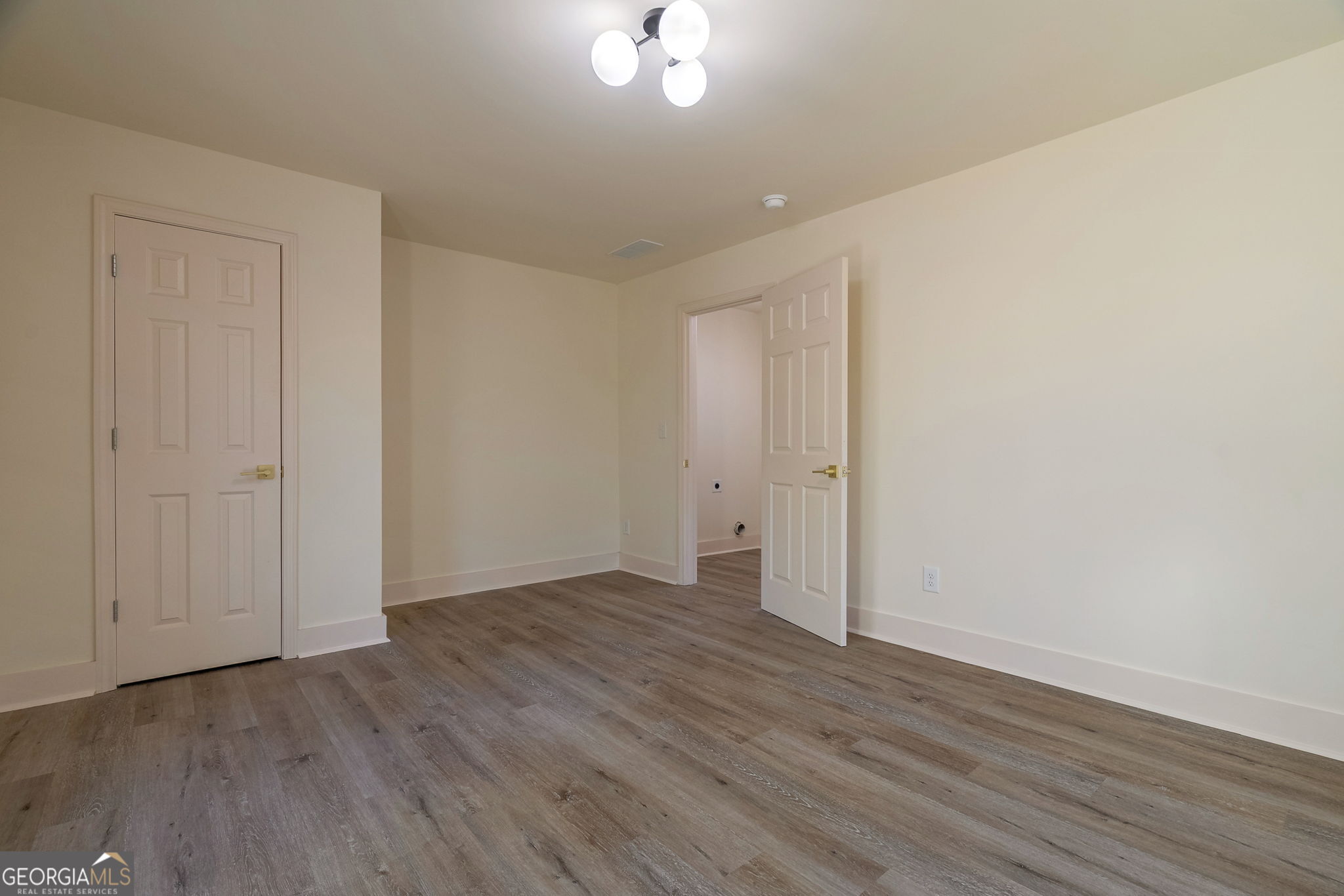 1021 Twins Road Greensboro, GA 30642 - Photo 17 of 32 a view of a room with wooden floor