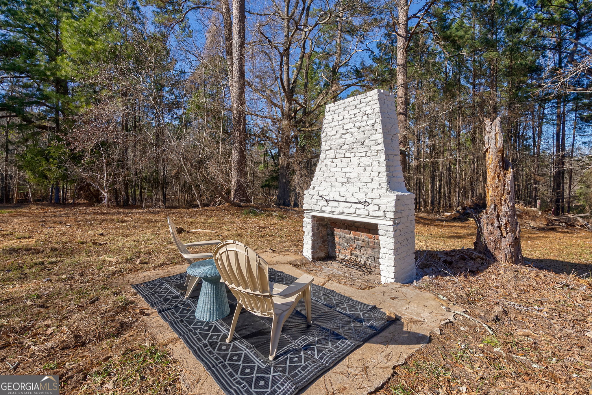 1021 Twins Road Greensboro, GA 30642 - Photo 22 of 32 a view of a patio with a fireplace