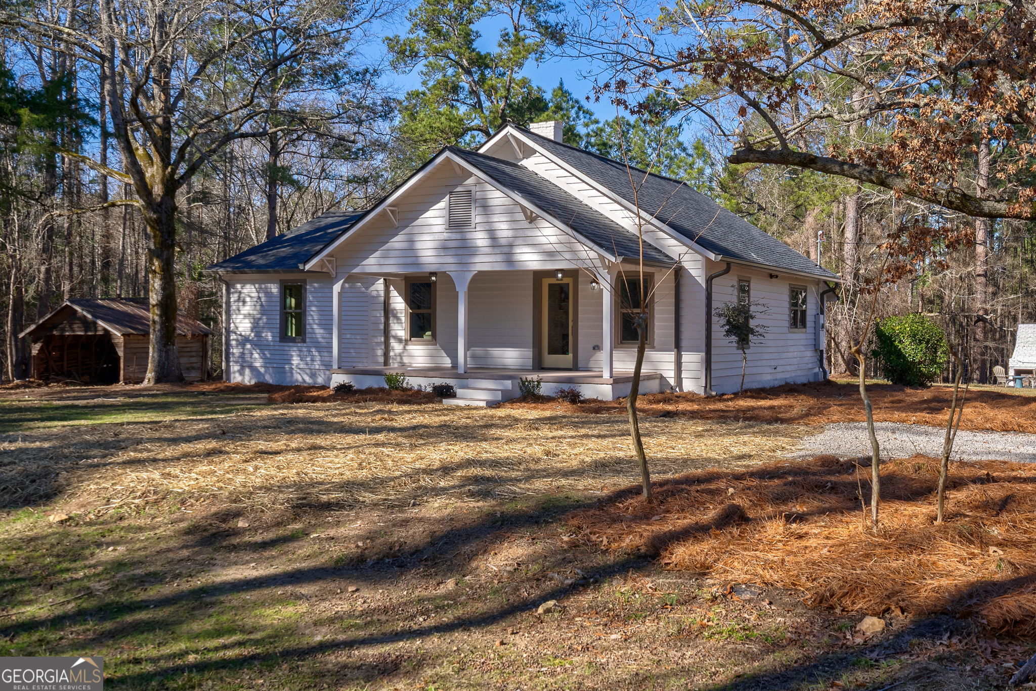 1021 Twins Road Greensboro, GA 30642 - Photo 24 of 32 a view of a house with large windows