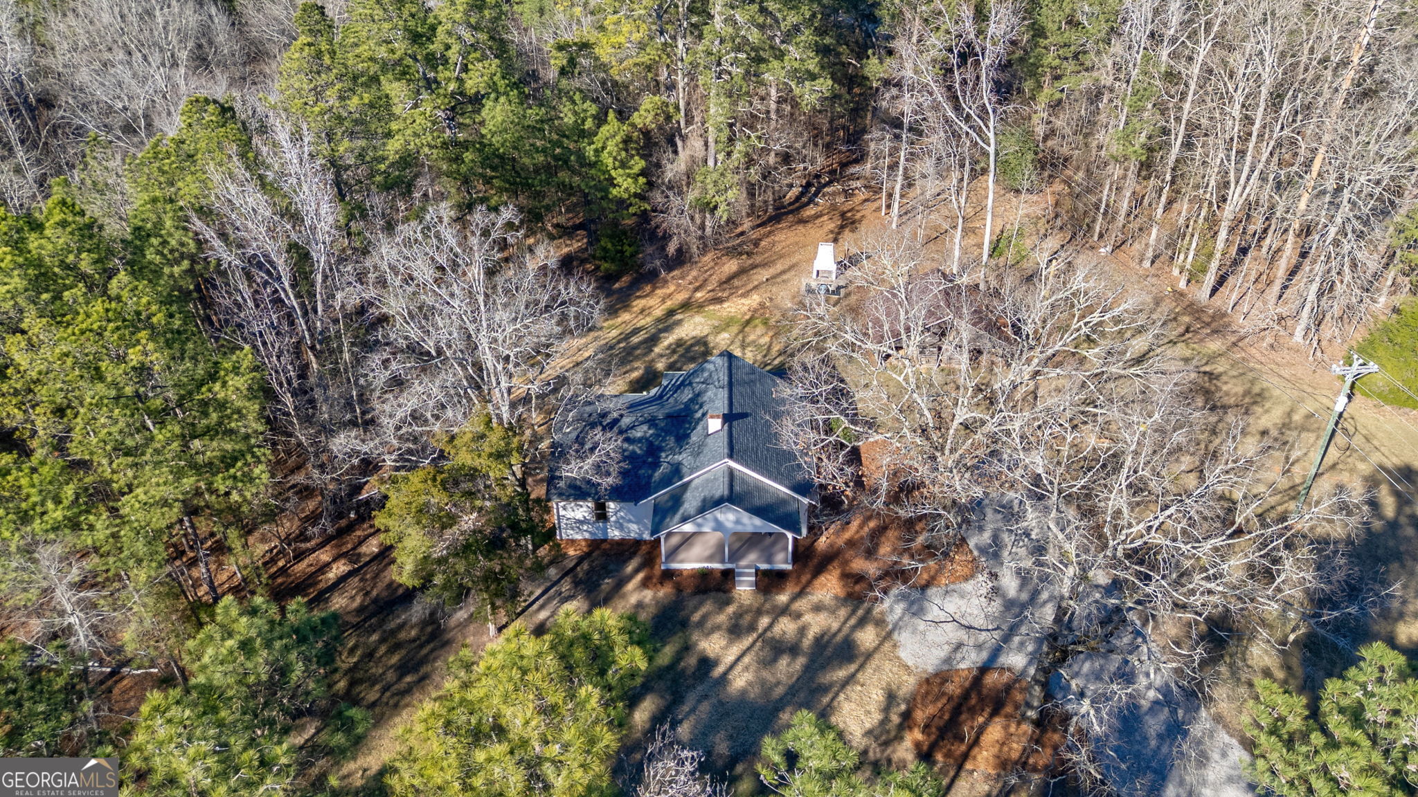 1021 Twins Road Greensboro, GA 30642 - Photo 29 of 32 a view of a city with lush green forest