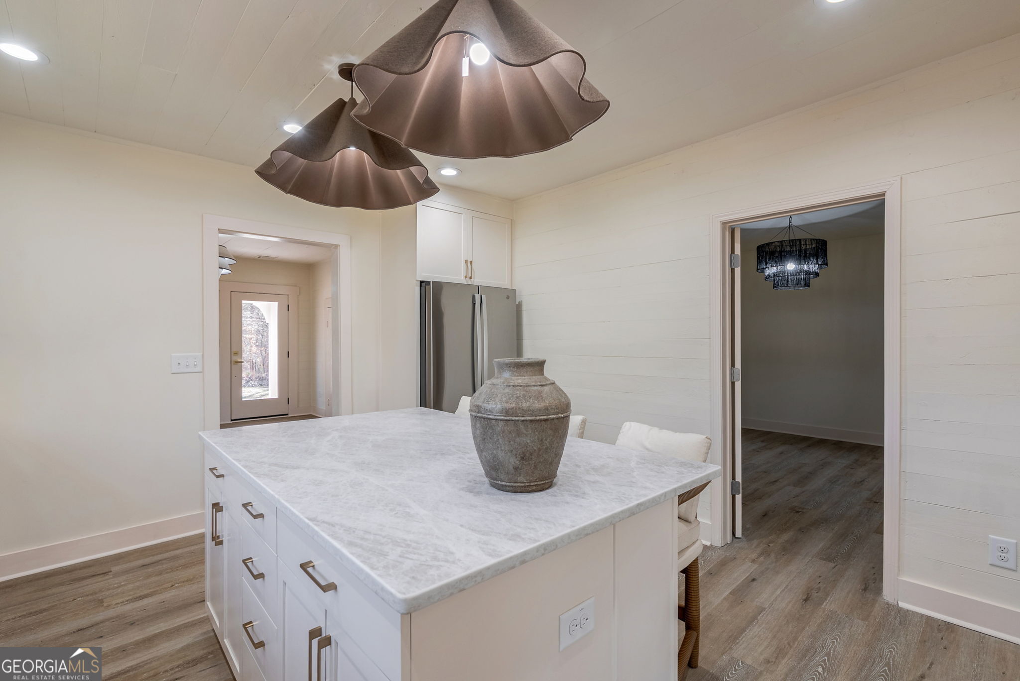 1021 Twins Road Greensboro, GA 30642 - Photo 4 of 32 a kitchen with a sink a counter space and cabinets