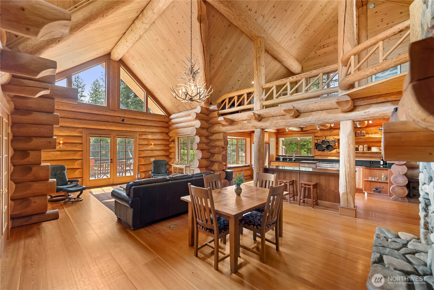 116 Lost River Road Mazama, WA 98833 - Photo 14 of 40 a view of a patio with swimming pool table and chairs