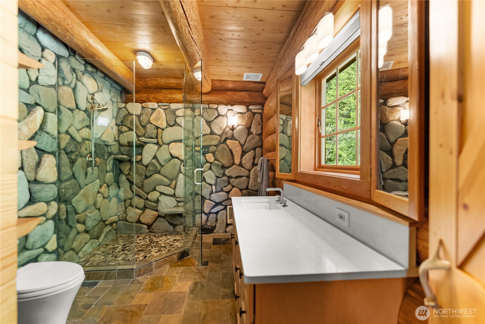 116 Lost River Road Mazama, WA 98833 - Photo 21 of 40 a bathroom with a sink toilet and shower