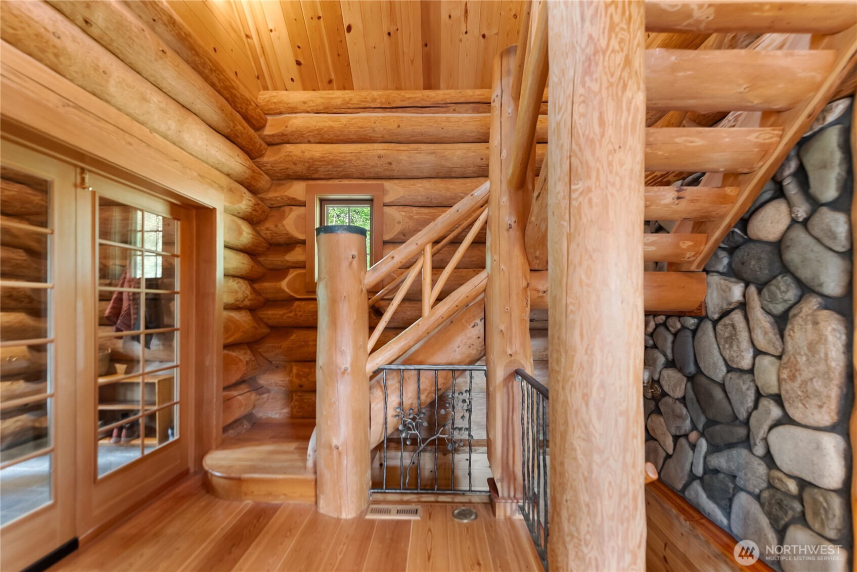 116 Lost River Road Mazama, WA 98833 - Photo 32 of 40 a view of front door with wooden floor and a window