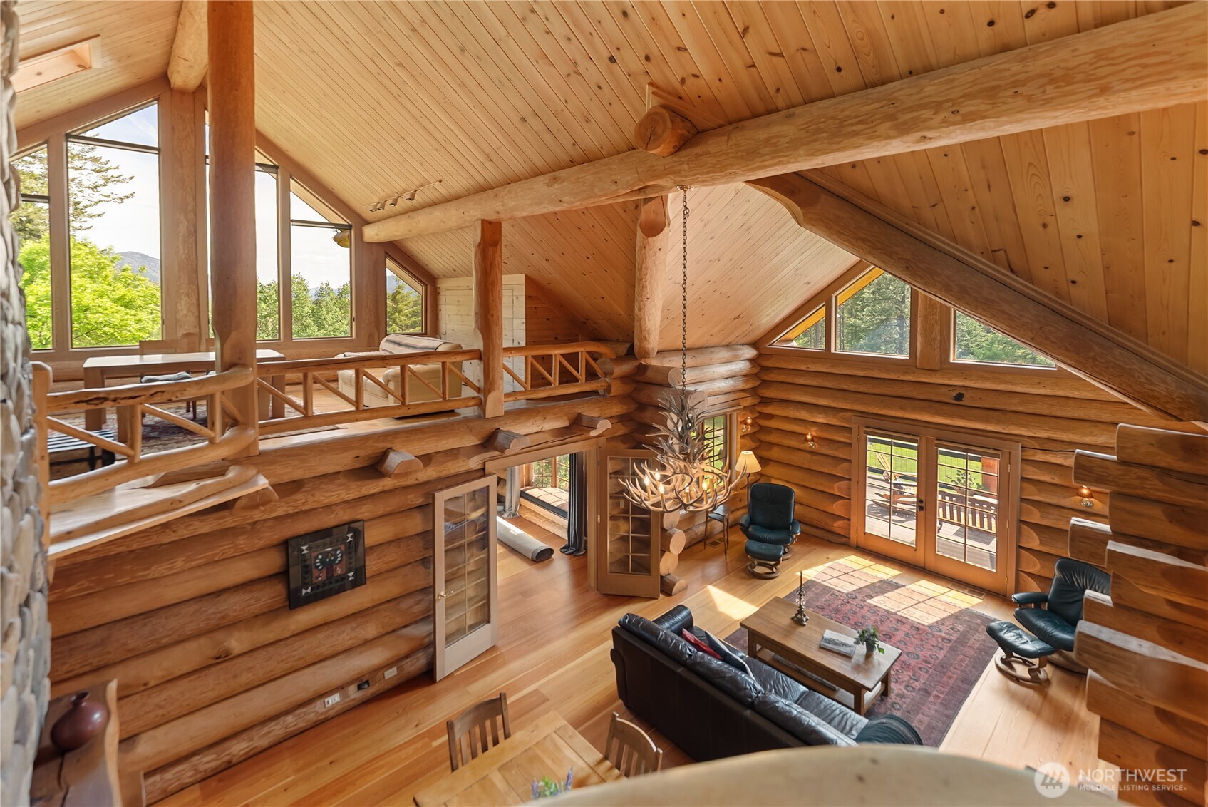 116 Lost River Road Mazama, WA 98833 - Photo 33 of 40 a living room with furniture and a window