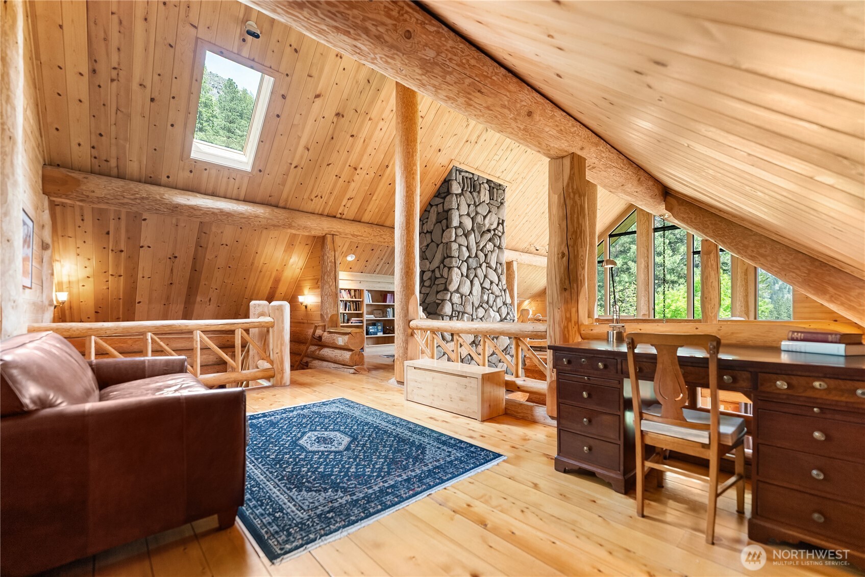 116 Lost River Road Mazama, WA 98833 - Photo 37 of 40 a living room with furniture and a window