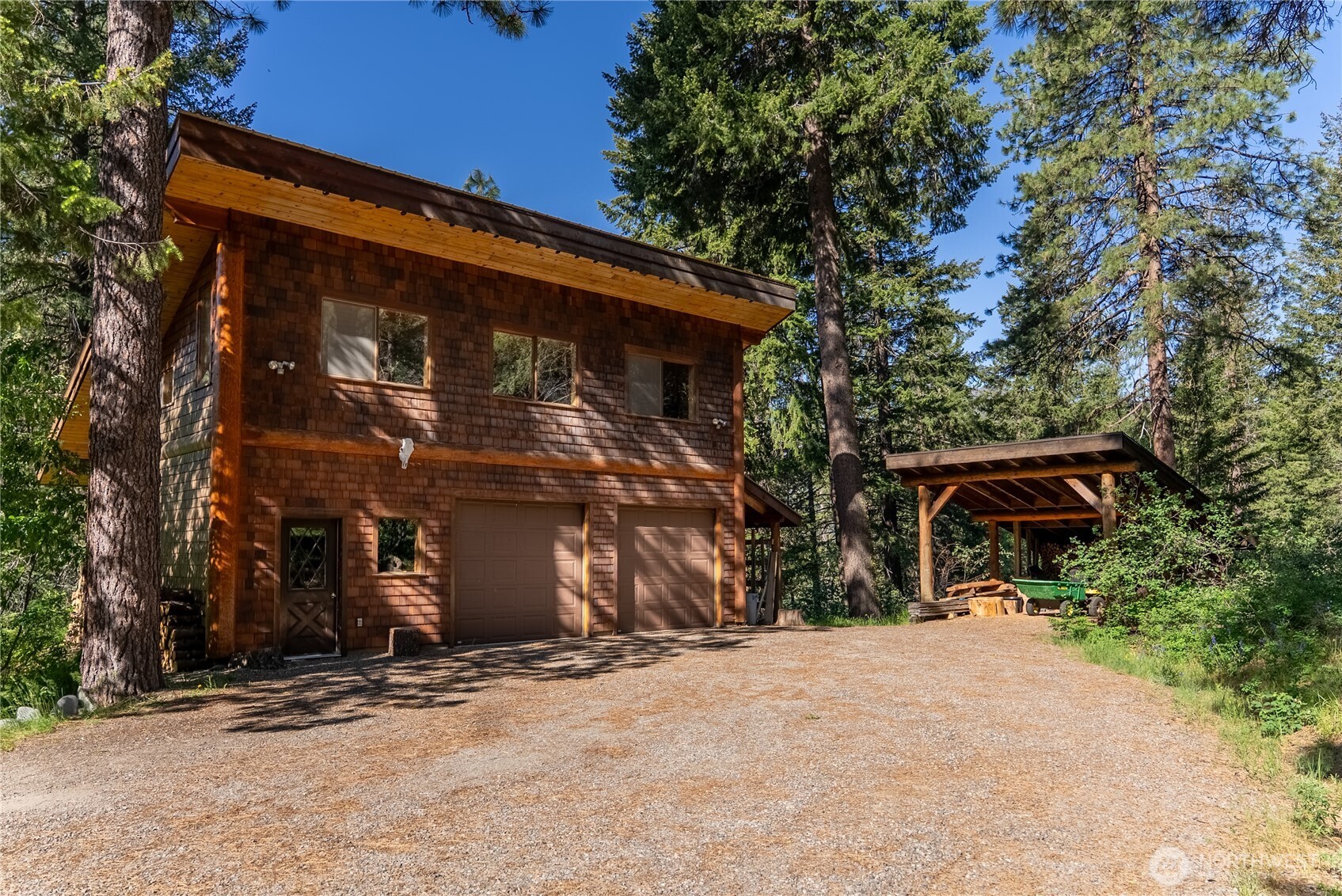 116 Lost River Road Mazama, WA 98833 - Photo 38 of 40 a front view of a house with a yard