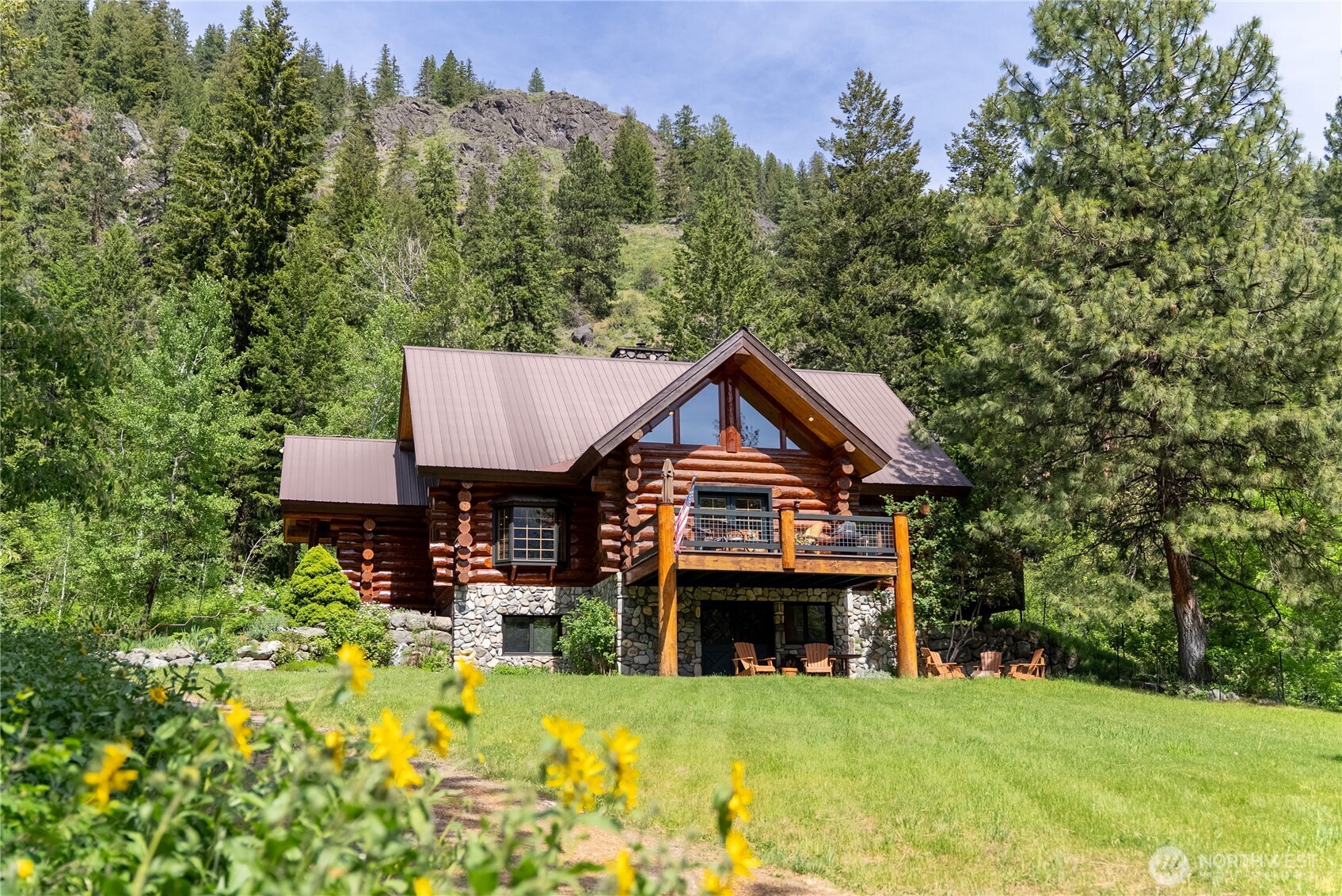 116 Lost River Road Mazama, WA 98833 - Photo 40 of 40 a front view of a house with yard and green space