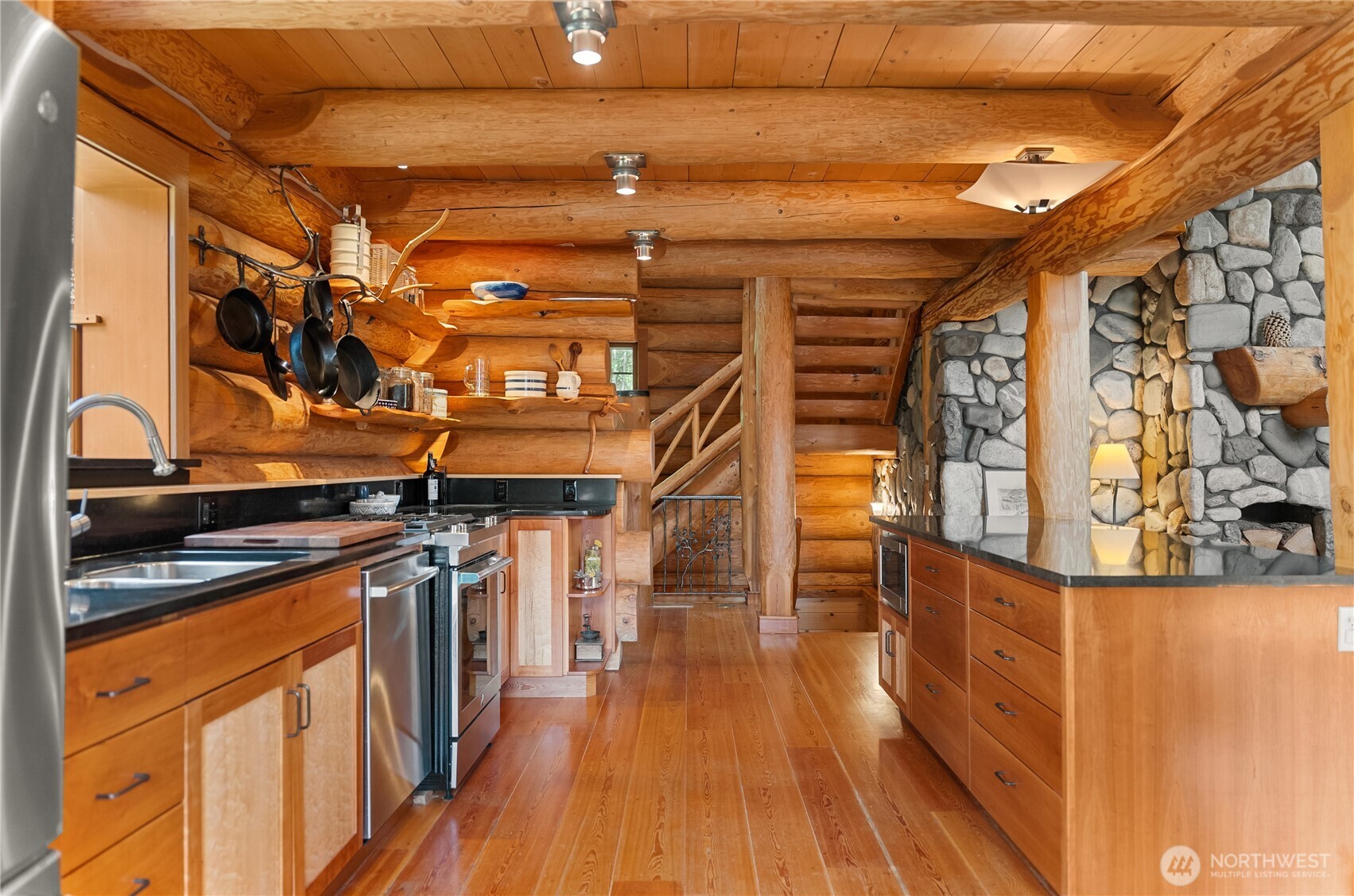 116 Lost River Road Mazama, WA 98833 - Photo 8 of 40 a view of a room with wooden floor