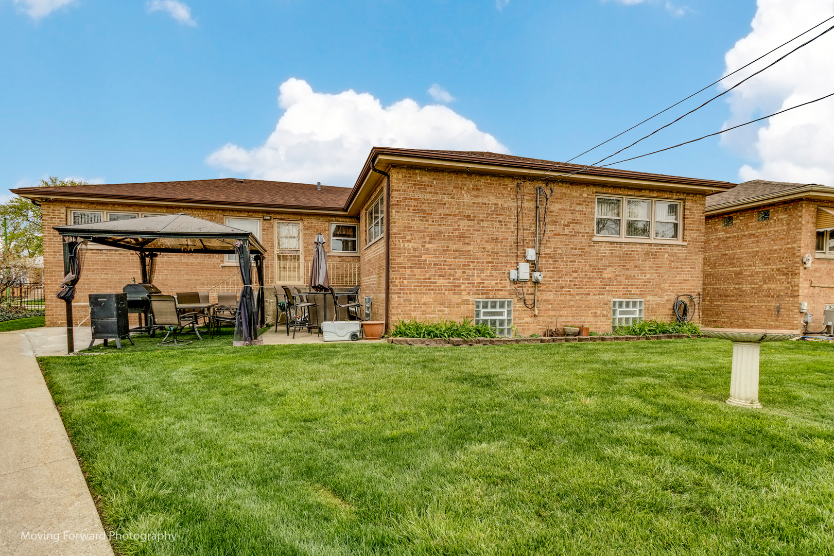 Undisclosed Address Chicago, IL 60652 - Photo 3 of 15 a view of a house with backyard