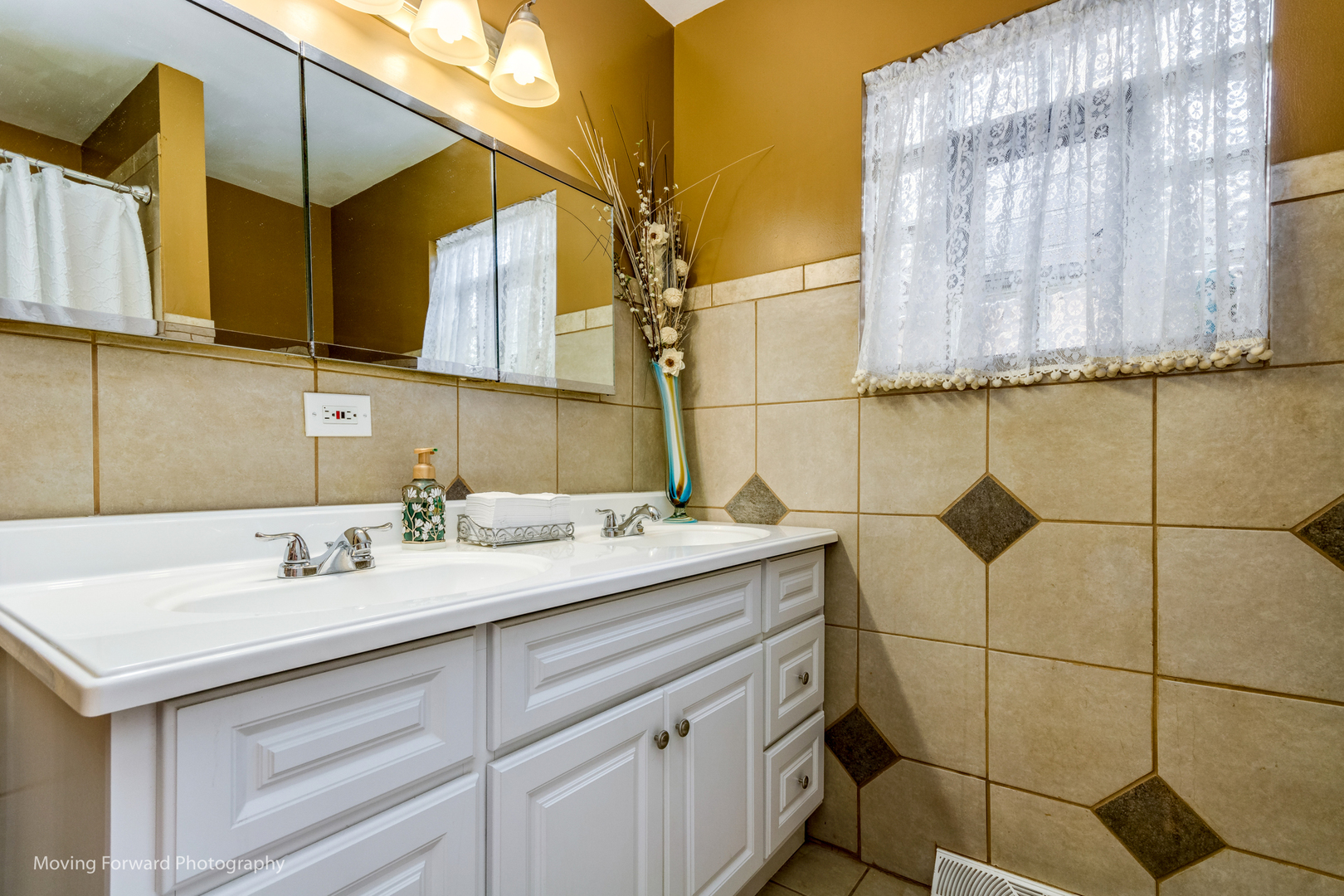 Undisclosed Address Chicago, IL 60652 - Photo 10 of 15 a bathroom with a sink and a mirror