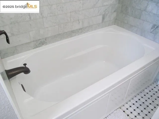 a bathroom with a bathtub