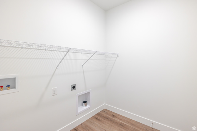 4661 Poplar Way, Unit R301 Mapleton, UT 84664 - Photo 4 of 17 Laundry area featuring washer hookup, light wood-style flooring, and hookup for an electric dryer