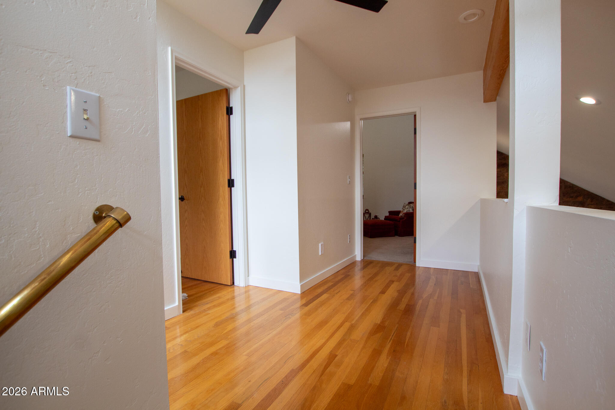 5120 Juniper Loop Pine, AZ 85544 - Photo 21 of 54 a view of hallway with wooden floor