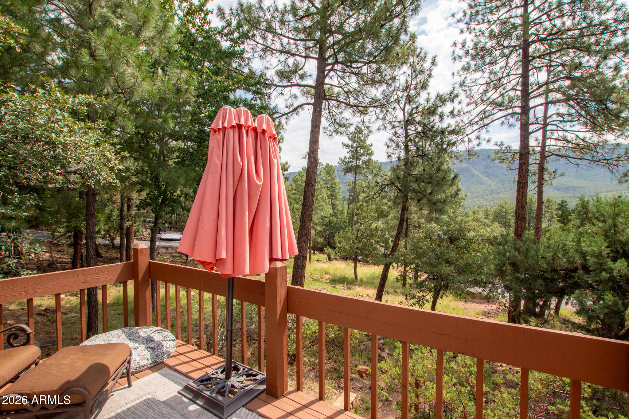5120 Juniper Loop Pine, AZ 85544 - Photo 37 of 54 a view of a deck with a backyard