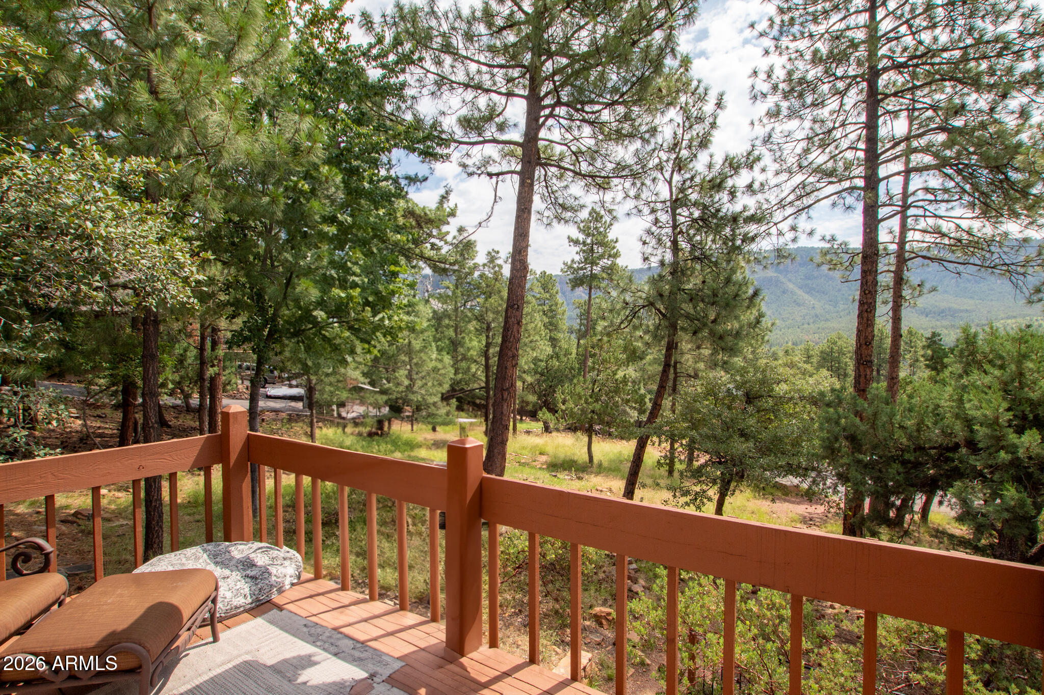5120 Juniper Loop Pine, AZ 85544 - Photo 38 of 54 a view of a wooden deck next to a yard