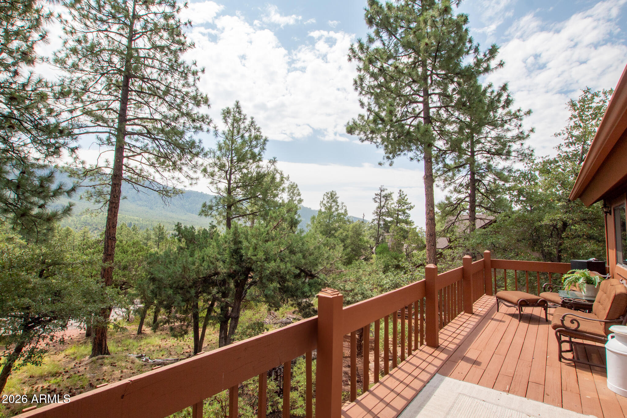 5120 Juniper Loop Pine, AZ 85544 - Photo 40 of 54 a view of balcony with wooden floor and trees