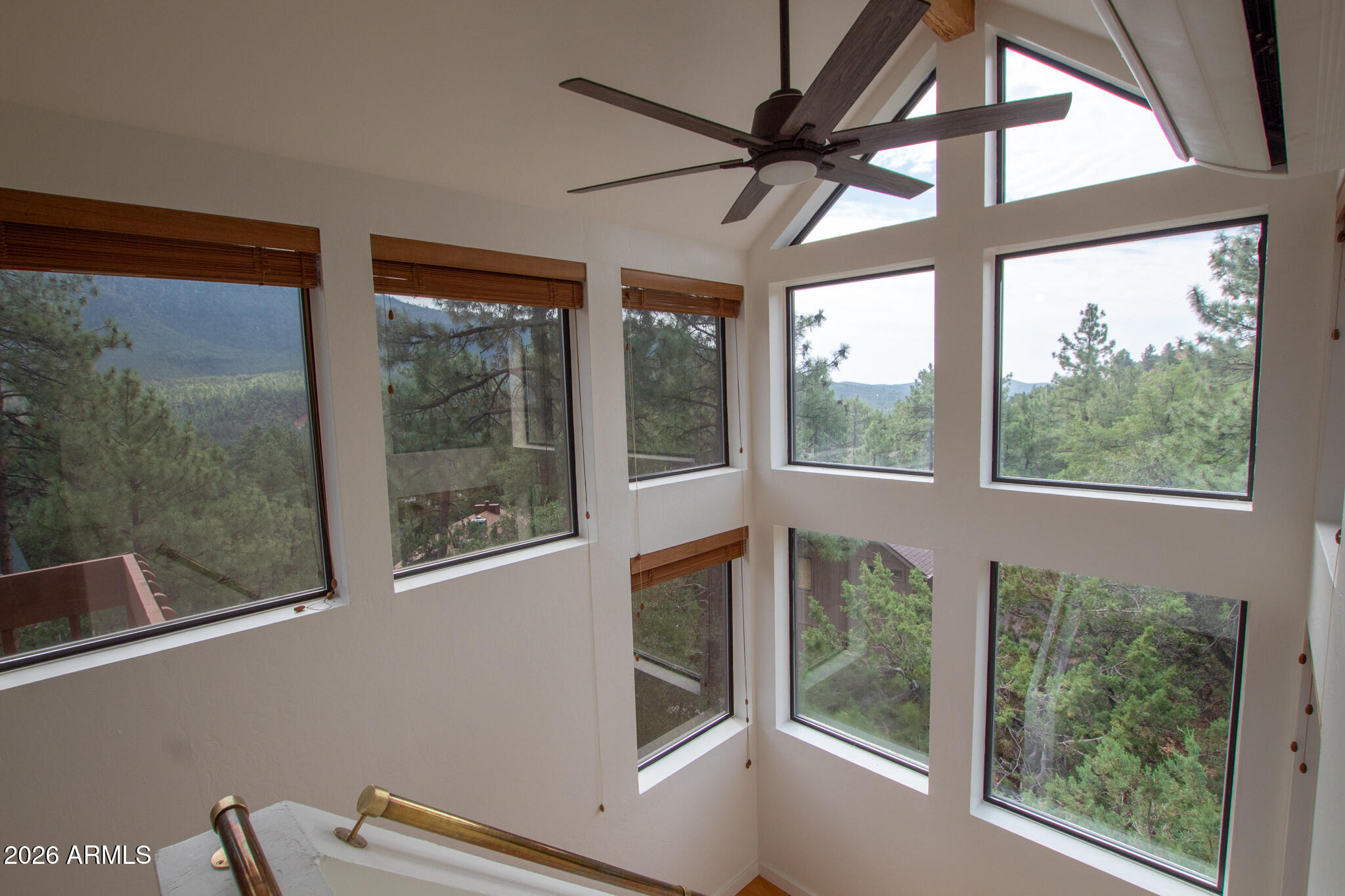 5120 Juniper Loop Pine, AZ 85544 - Photo 9 of 54 a view of a house with a large window
