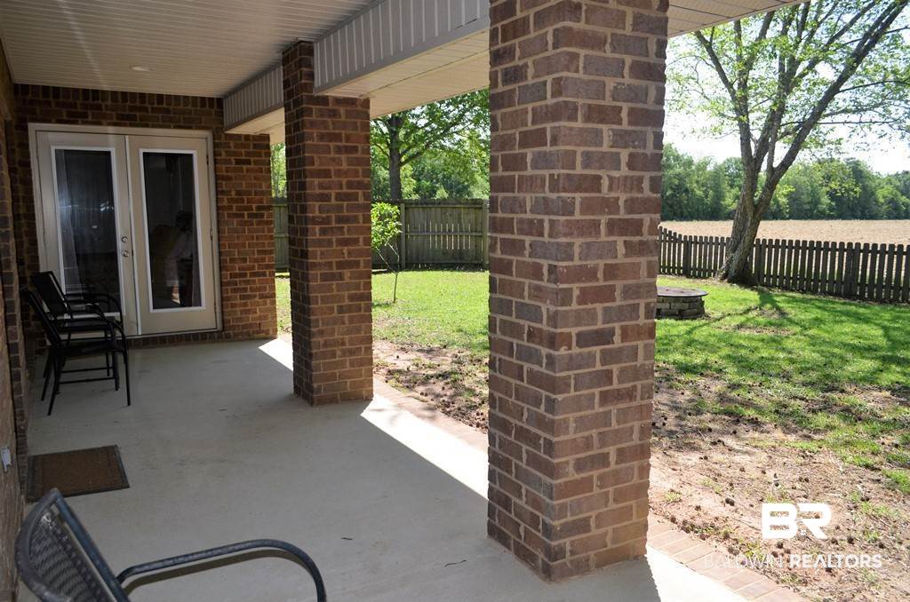 619 Fulton Loop Foley, AL 36535 - Photo 31 of 33 Covered Back Porch