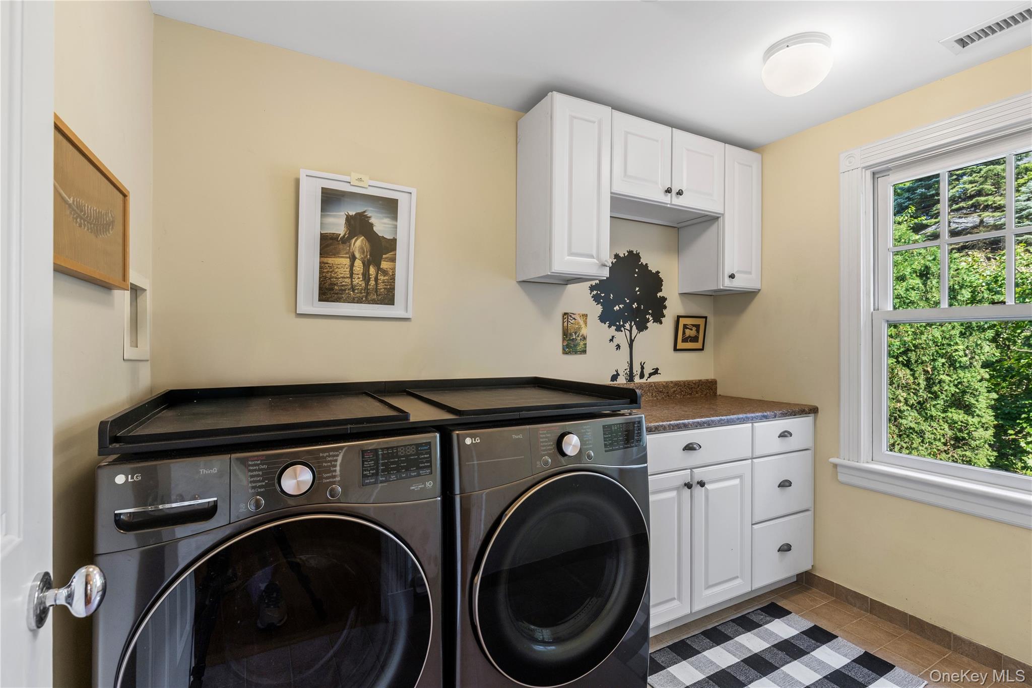 12 Kenmare Road Larchmont, NY 10538 - Photo 23 of 36 The second floor laundry is well appointed and extremely convenient. The space is generous enough to accomodate other uses.