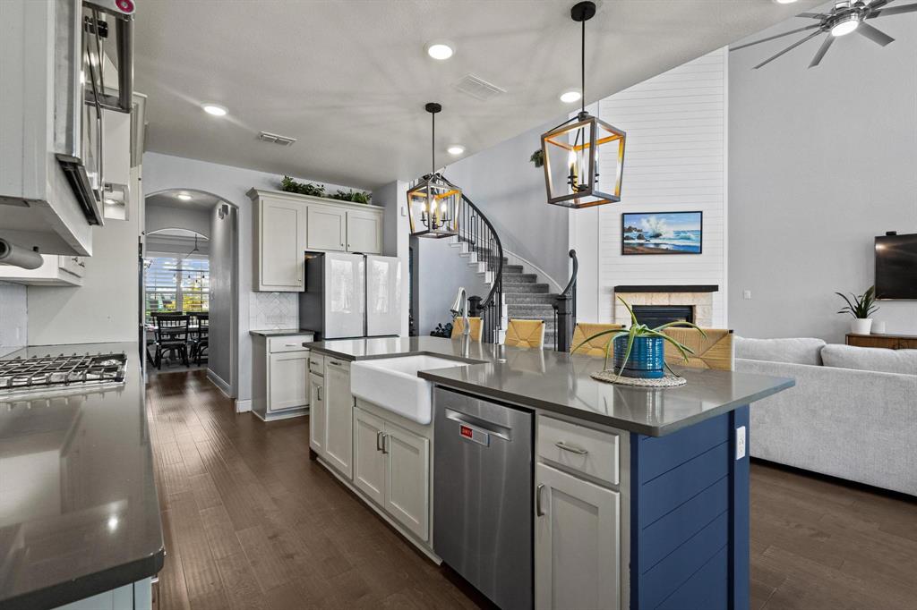 13798 Fernando Road Frisco, TX 75035 - Photo 13 of 39 a kitchen with sink cabinets and window
