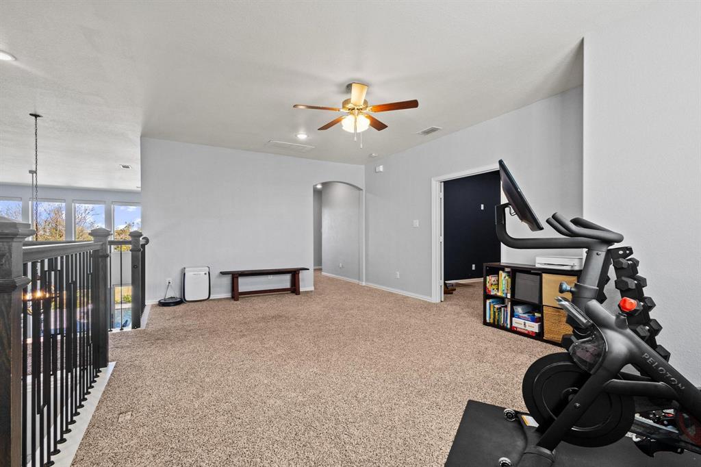 13798 Fernando Road Frisco, TX 75035 - Photo 24 of 39 a view of a room with gym equipment