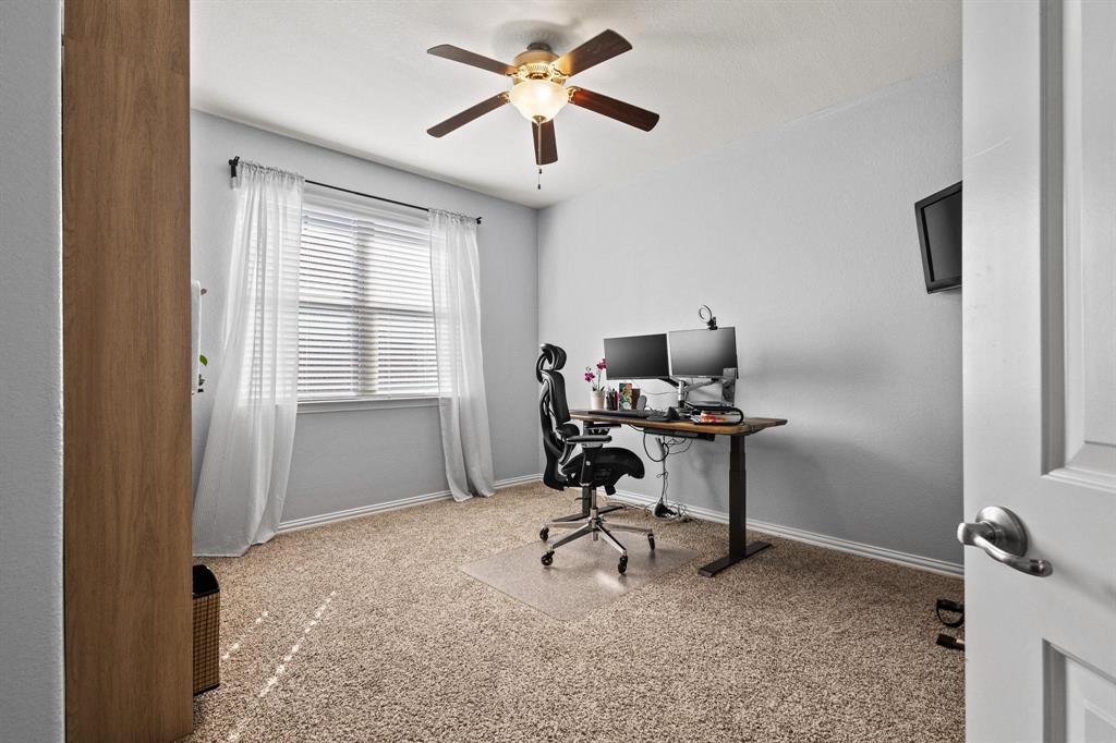 13798 Fernando Road Frisco, TX 75035 - Photo 26 of 39 a workspace with chandelier a rug and a window