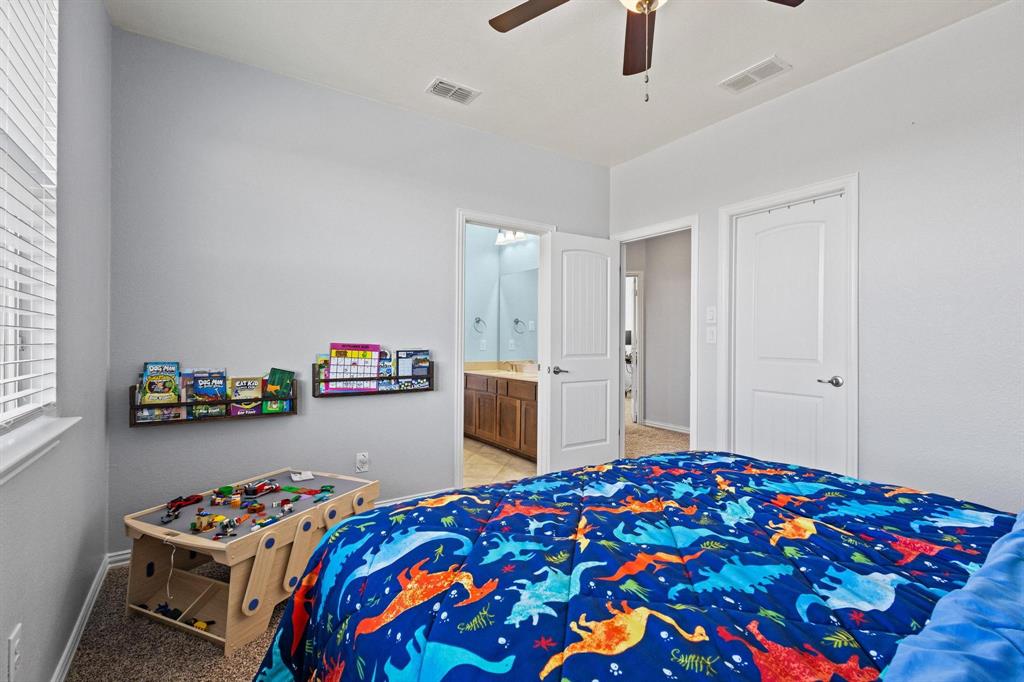 13798 Fernando Road Frisco, TX 75035 - Photo 29 of 39 a bedroom with bed and a window