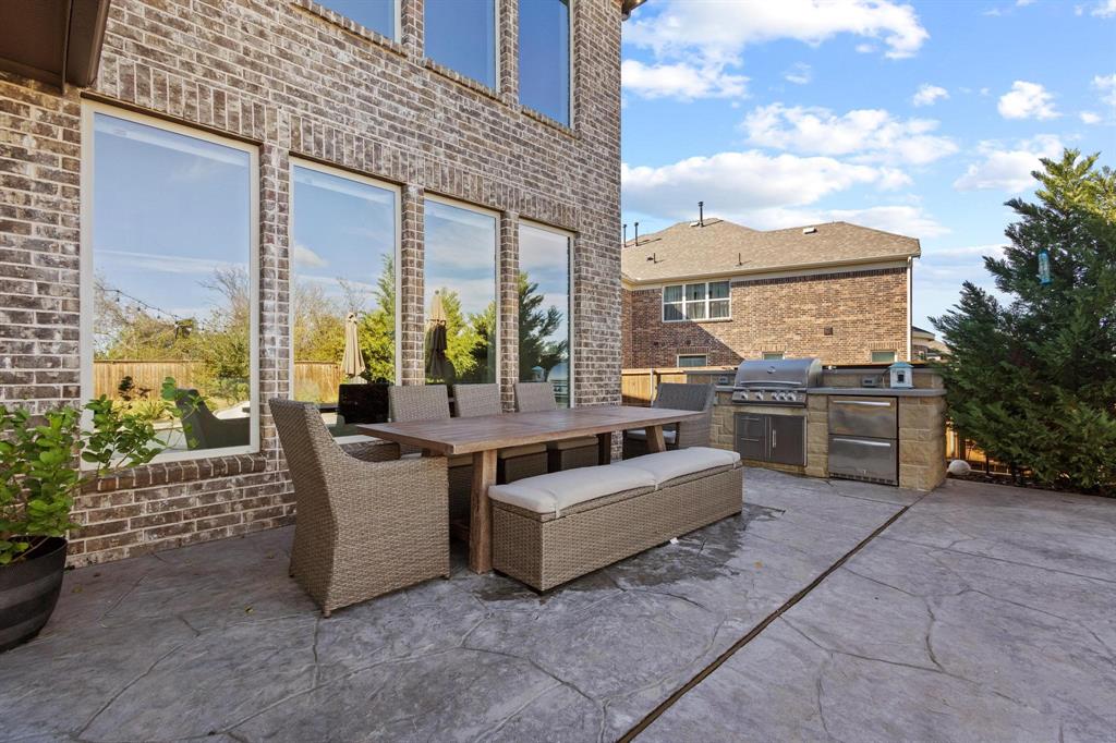 13798 Fernando Road Frisco, TX 75035 - Photo 33 of 39 a view of a patio with couches and potted plants