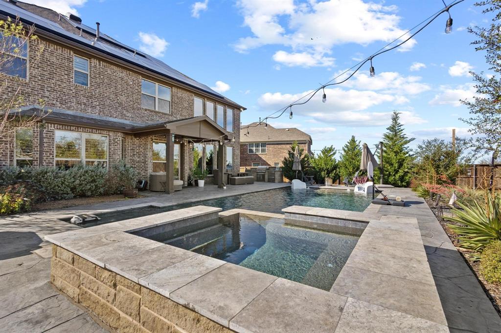 13798 Fernando Road Frisco, TX 75035 - Photo 35 of 39 a view of a house with sitting area and swimming pool