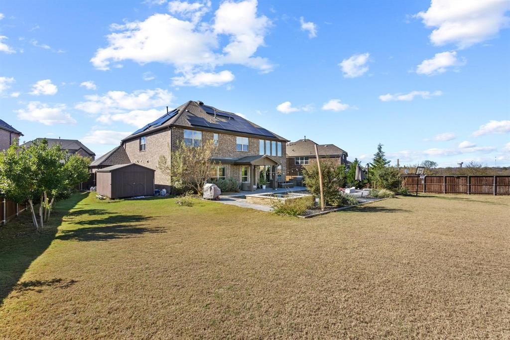 13798 Fernando Road Frisco, TX 75035 - Photo 36 of 39 a view of a house with a yard