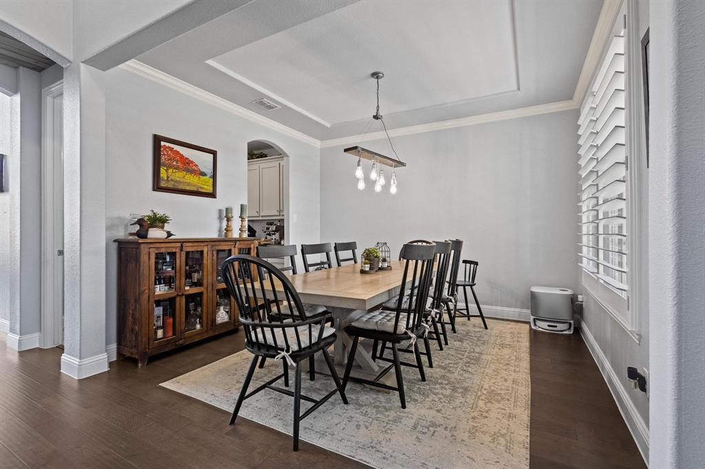 13798 Fernando Road Frisco, TX 75035 - Photo 4 of 39 a view of a dining room with furniture and wooden floor