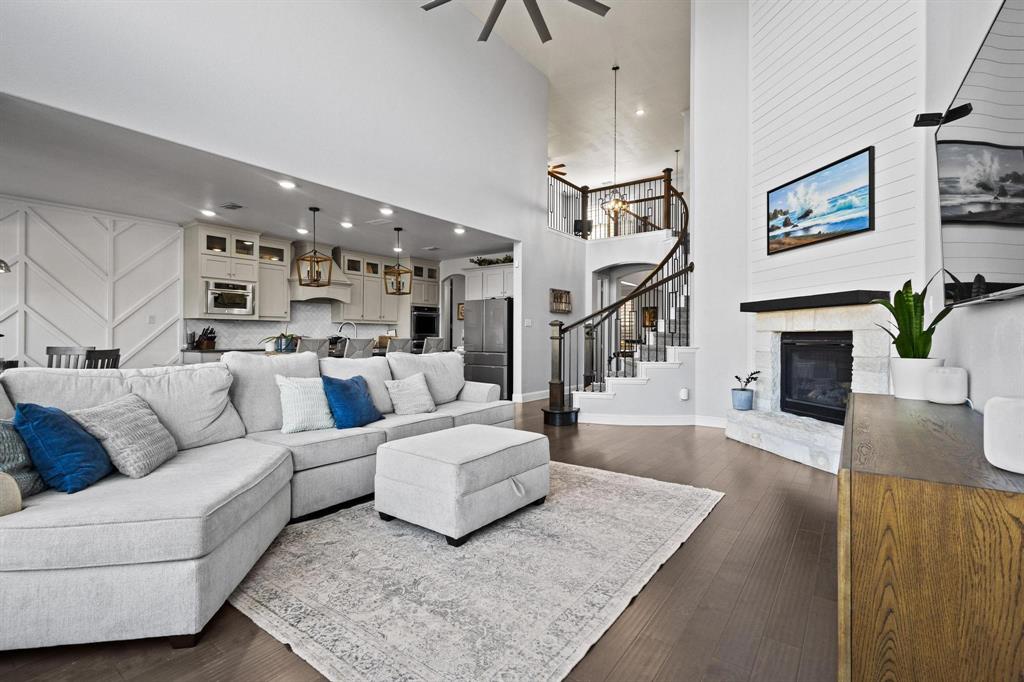 13798 Fernando Road Frisco, TX 75035 - Photo 8 of 39 a living room with furniture and a fireplace