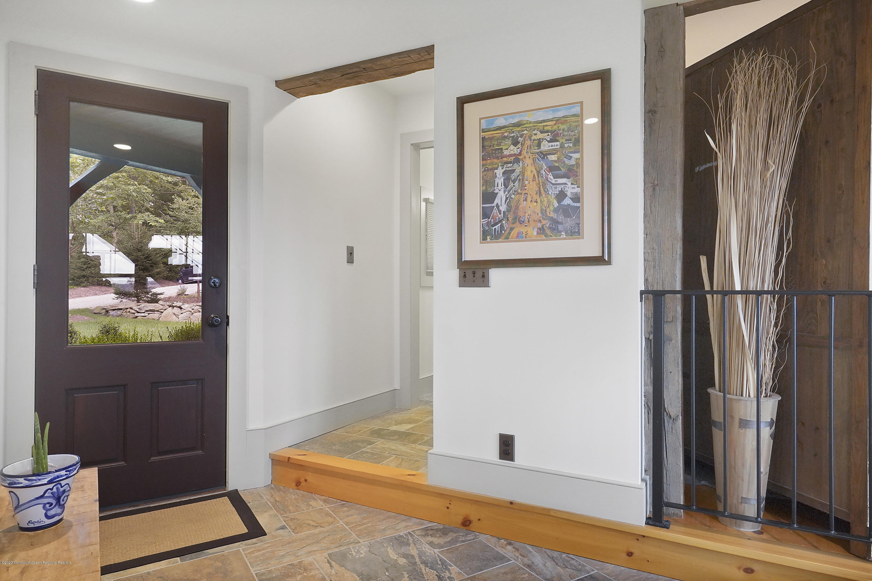 37 Ridge Road Lebanon, NJ 08833 - Photo 42 of 82 a view of a hallway with a window and wooden floor