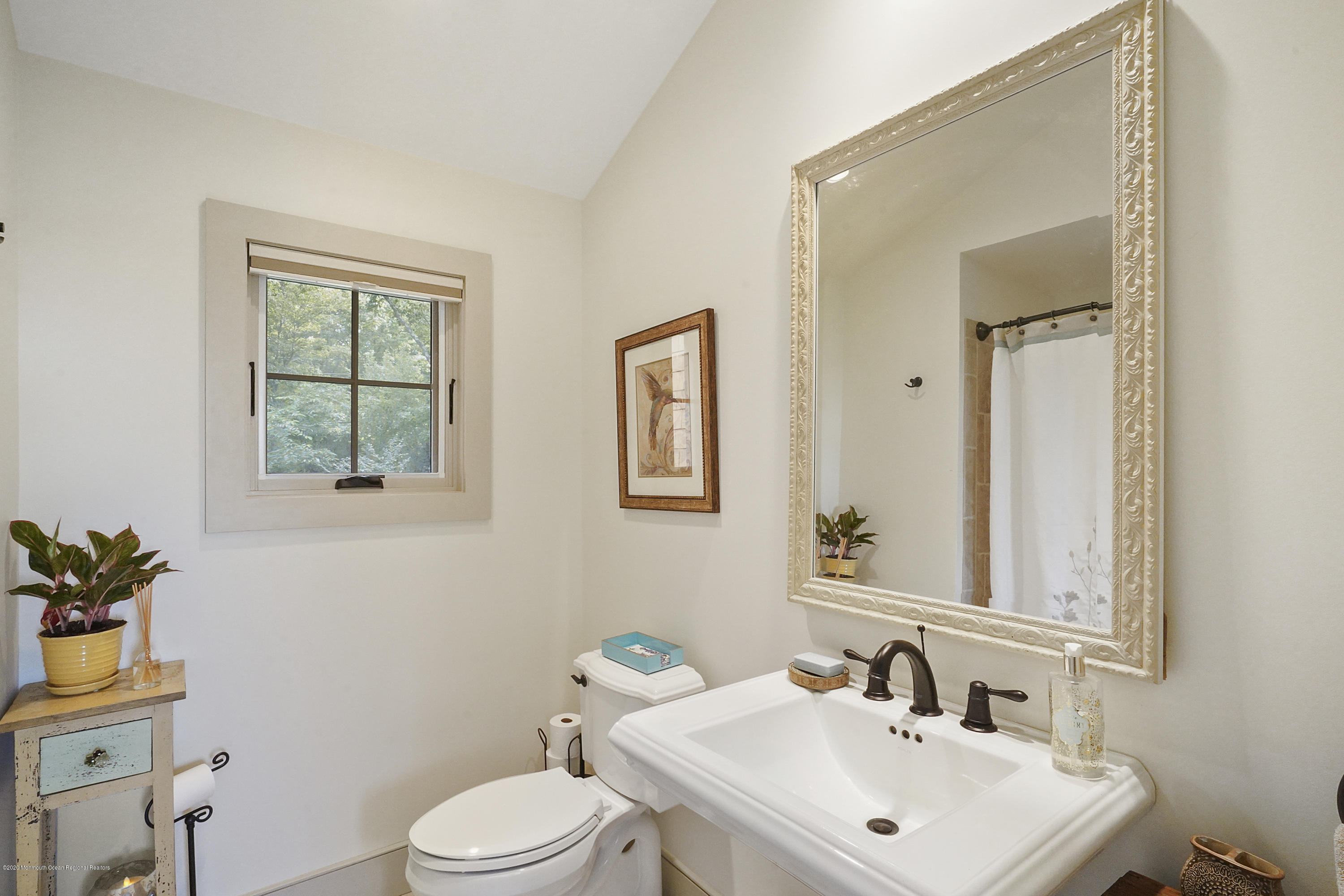 37 Ridge Road Lebanon, NJ 08833 - Photo 53 of 82 a bathroom with a sink mirror and a toilet