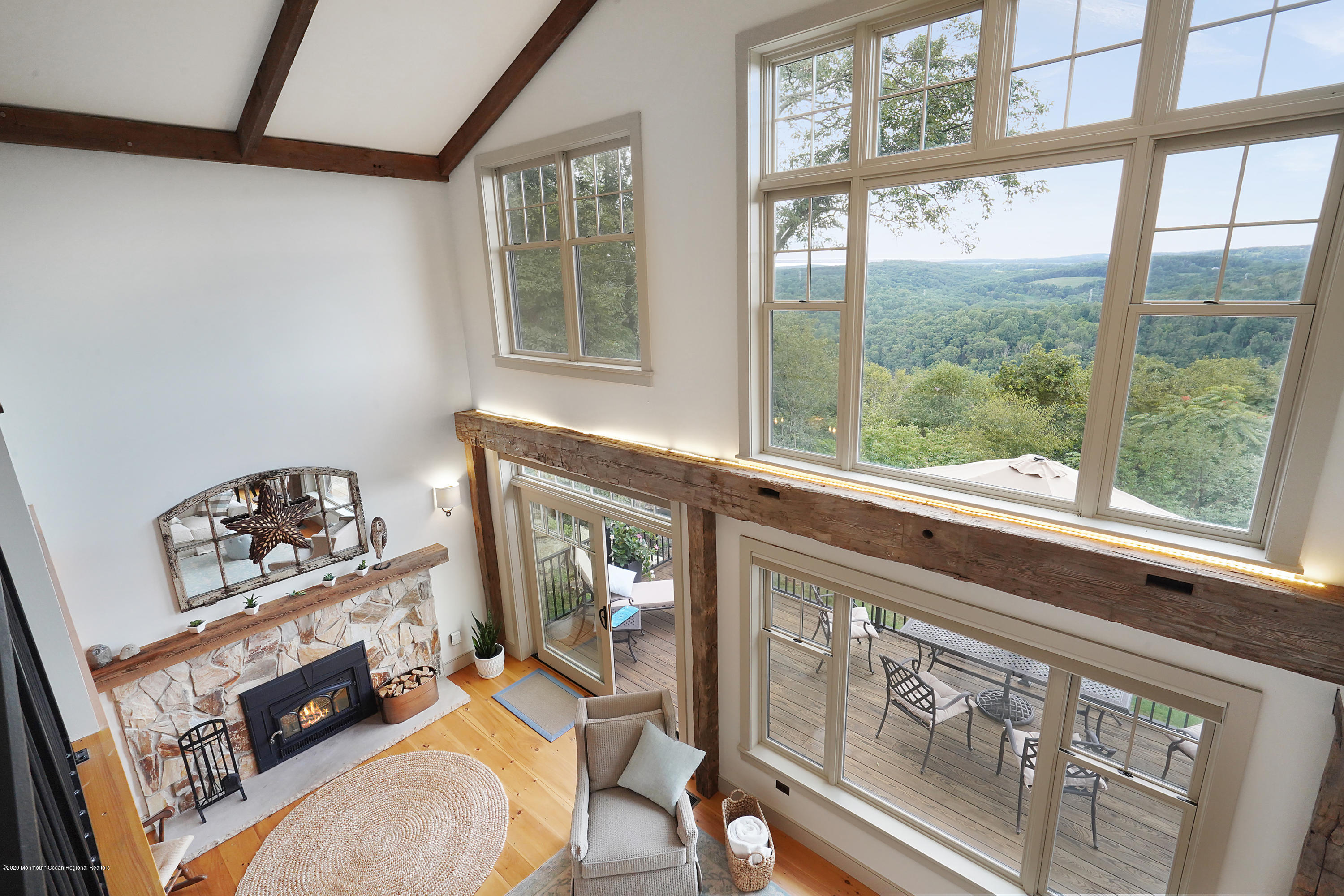 37 Ridge Road Lebanon, NJ 08833 - Photo 68 of 82 a living room with furniture a fireplace and a large window