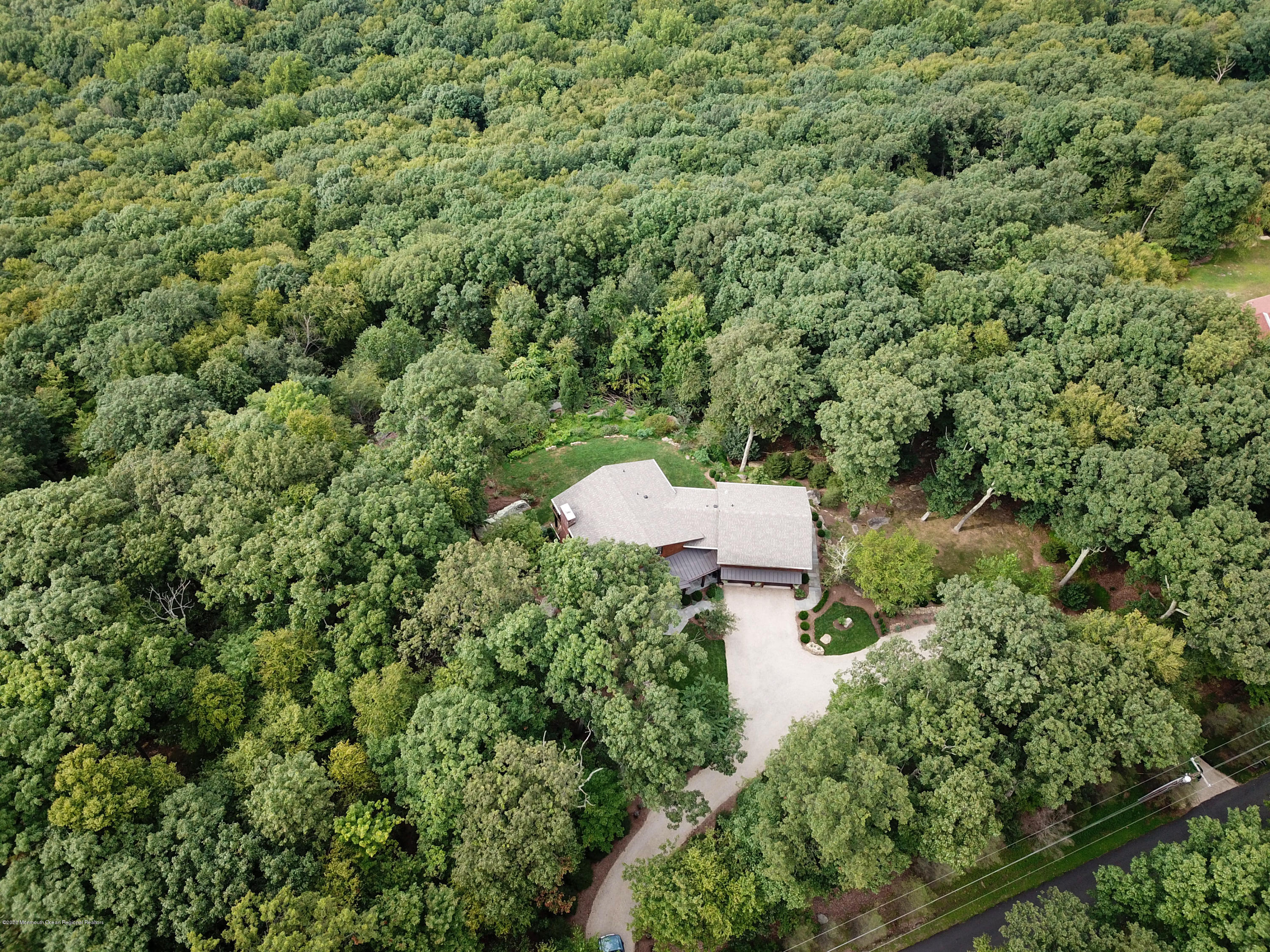 37 Ridge Road Lebanon, NJ 08833 - Photo 71 of 82 an aerial view of a house with a yard