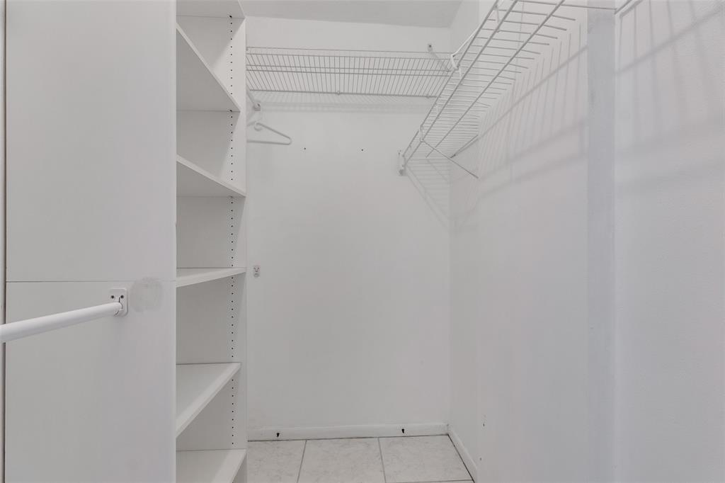 320 South Surf Road, Unit 304 Hollywood, FL 33019 - Photo 19 of 20 a view of walk in closet with empty racks