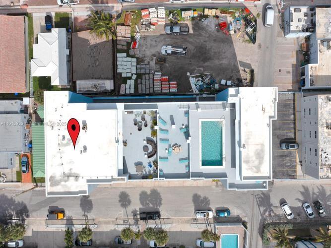 320 South Surf Road, Unit 304 Hollywood, FL 33019 - Photo 3 of 20 a bathroom with sink and mirror