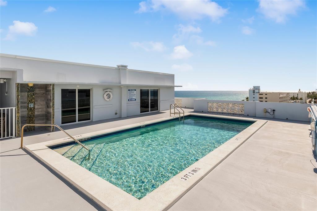 320 South Surf Road, Unit 304 Hollywood, FL 33019 - Photo 8 of 20 a view of a couches in front of the house