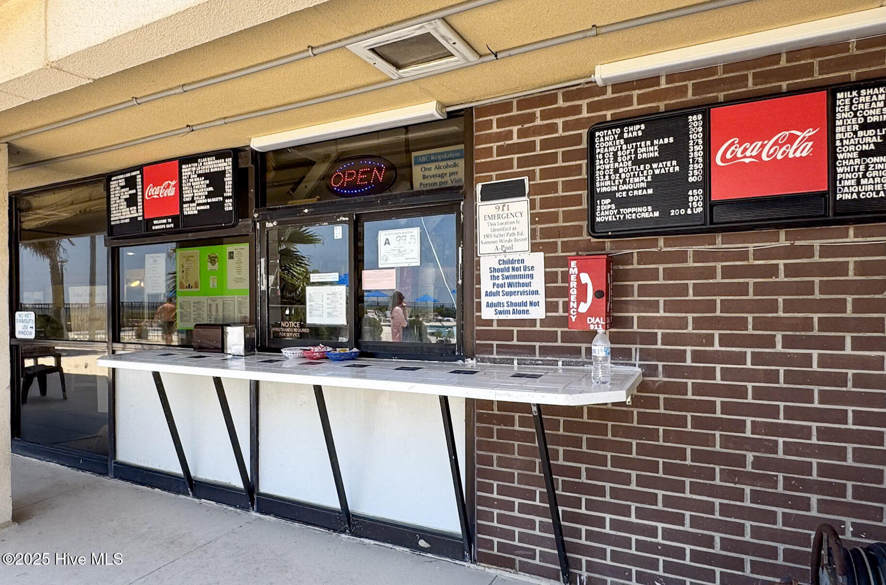 1505 Salter Path Road, Unit 325 Indian Beach, NC 28512 - Photo 29 of 46 Poolside Snackbar Outside Cafe