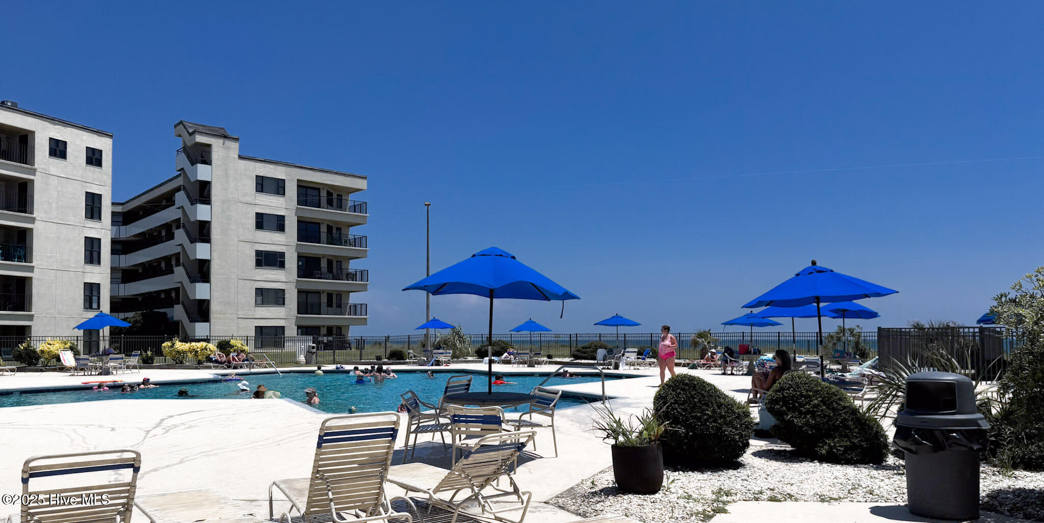 1505 Salter Path Road, Unit 325 Indian Beach, NC 28512 - Photo 31 of 46 Pool outside Ginger Care
